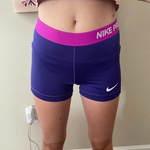 Nike pros in purple